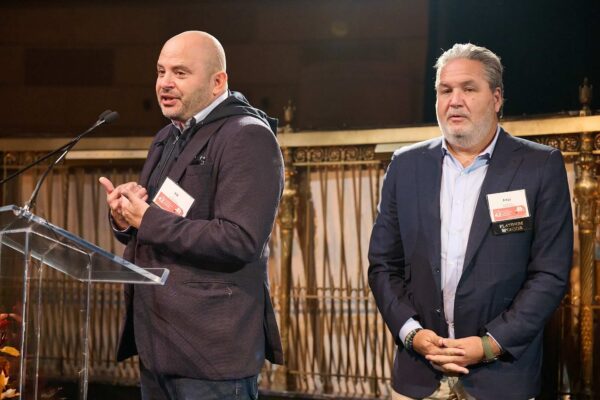 Eli Weiss, CEO of Joy Construction accepting award